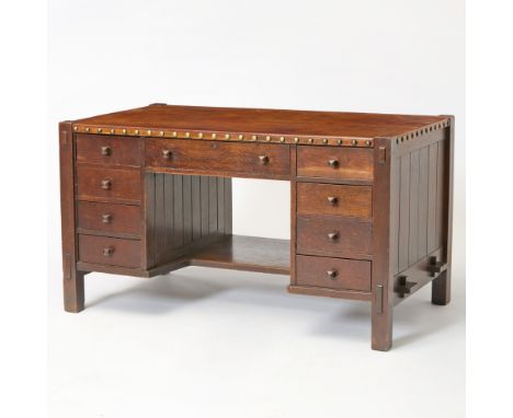 Early 20th centuryThe rectangular top above one long and eight short drawers, with shelf stretcher. Height 30 inches, width 5