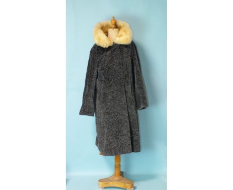 A fake Persian lamb coat with fur collar, an opossum gilet, a musquash stole, four Japanese embroidered silk panels and other