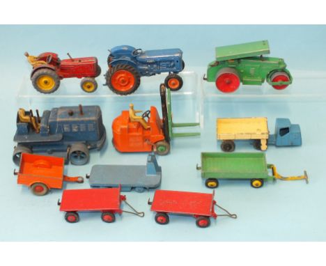 Dinky Supertoys: 563 Heavy Tractor, blue, 14C Coventry Climax Fork-lift Truck and other tractors, etc, all play-worn, (no box