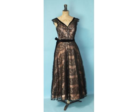 Kenilworth Model, a vintage 1950's lace and satin cocktail dress, the floral back lace overdress trimmed at the neck with vel