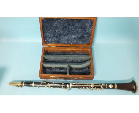An E J Albert, Brussels, rosewood B? clarinet with nickel keys, standard pitch, simple system, in modern case. 