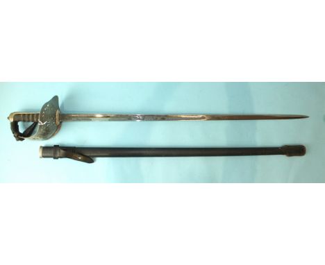 A Queen Elizabeth II officer's dress sword with 82cm Wilkinson blade, pierced steel shell guard, rayskin grip, brown leather 