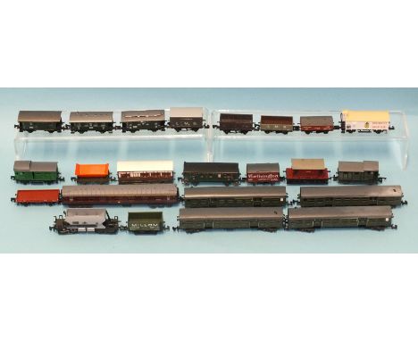 A quantity of unboxed N gauge coaches and wagons by Fleischmann (x3), Trix (x6), Graham Farish (x4), Arnold (x4) and others (