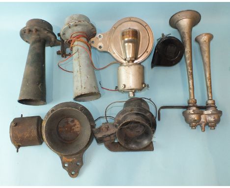 Three vintage Klaxon car horns and four others. 