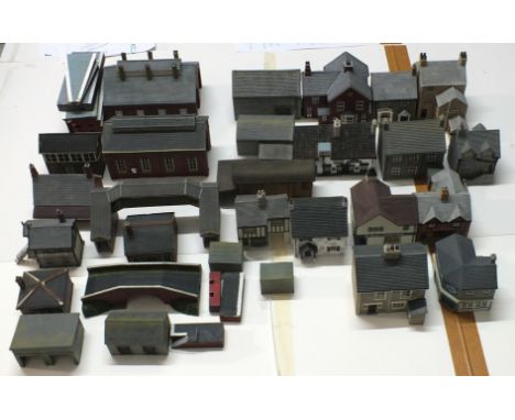 A quantity of Hornby Hobbies Ltd and Bachmann railway and other buildings, including pubs, shops, houses and farm buildings, 