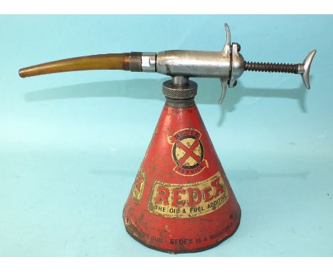 A Redex oil and fuel additive applicator, an Ashland Products vintage car jack and two grease guns. 