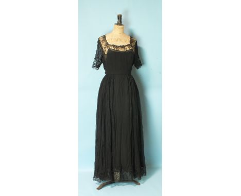 A vintage black silk chiffon and lace evening dress with silk slip, size UK12 approximately, a black silk velvet evening cape