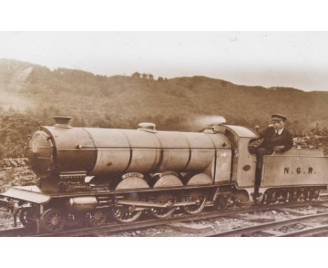 *Local Interest - A sepia tone photographic print of the Sir Aubrey Brocklebank narrow gauge locomotive and tender, displayed