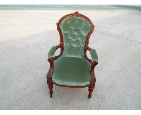 A button back chair and a further button back arm chair of similar pattern (2)