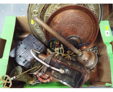 A good mixed lot to include a collection of brass and copper ware, including a lantern and a large decorative brass plate
