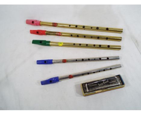 Five Tin Whistles key of Bb, C, D, F and G, and a Hohner Song Bird Vamper Harmonica G