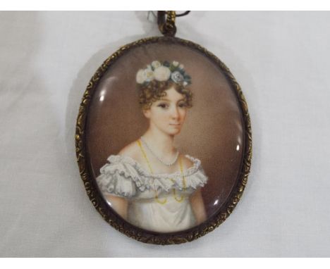 English School oval pendant portrait miniature probably on ceramic in gilt metal frame with cobalt blue enamel back  depictin