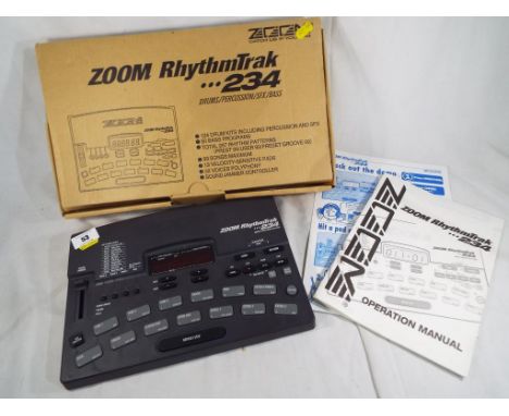 A Zoom RhythmTrak 234, drums, percussion, sfx, bass with manual in original box