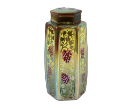 A Pilkingtons Royal Lancastrian lustre hexagonal jar and cover, by William S. Mycock, painted with red grapes and silver-gree