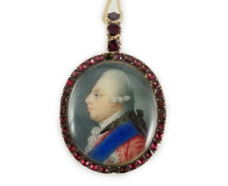 A George III Royal Presentation gold mounted and garnet set oval pendant, with inset miniature portrait of a gentleman to dex