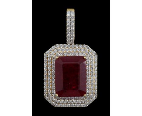 A large modern 18ct gold and single emerald cut synthetic ruby set pendant, bordered by three concentric bands of round brill