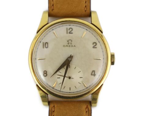 A gentleman's late 1940's 18ct gold Omega manual wind wrist watch, with baton and Arabic numerals and subsidiary seconds, mov