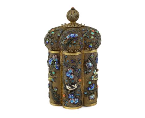 A Chinese silver gilt and enamel jar and cover, mid 20th century, of lobed cylindrical form decorated with birds on flowering