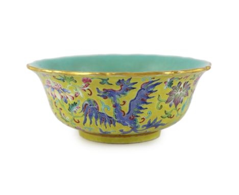 A Chinese yellow ground ‘phoenix’ bowl, Daoguang mark and of the period (1821-50), the exterior painted with four different p