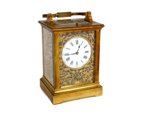 Henri Jacot. A late 19th century French quarter repeating carriage clock, circa 1885, with ormolu and glass case with enamell