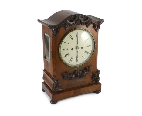 J. King of St Albans. A William IV mahogany bracket clock in architectural case with flower and scroll appliqué motifs and pa