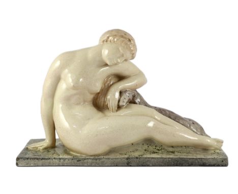 Georges Chauvel (French 1886-1962). An Art Deco ceramic figure of a sleeping Diana, signed, impressed marks, 41cm wide***COND