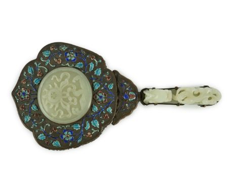 An early 20th century Chinese enamelled copper hand mirror with 18th/19th century Chinese pale celadon jade mounts, the back 