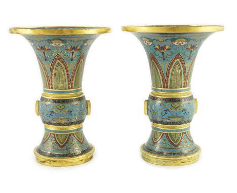 A pair of Chinese cloisonné enamel beaker vases, each decorated with leaf scrolls, ruyi heads, lotus flowers and lappets, eac