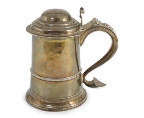 A mid 18th century provincial silver tankard, by John Langlands I, with domed cover and scroll thumbpiece, the body with band