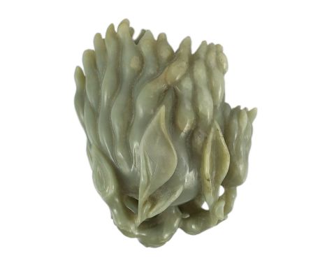 A Chinese celadon jade carving of a finger citron, 20th century, the stone with occasional white and russet inclusions, 12.5c