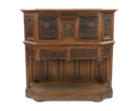 An antique oak dresser, based on a 15th century French gothic model and very similar to an example in the Wallace Collection,