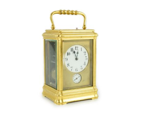 An early 20th century French ormolu Grande Sonnerie alarum clock with enamelled Arabic dials and gorge case, movement strikin