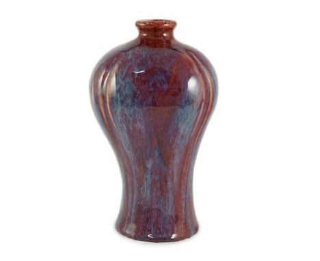 A Chinese flambé glazed lobed meiping, 18th century, of quatrelobed section, with a caramel glazed base, 29cm high, glaze chi