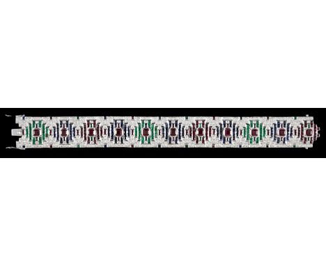 An attractive late 20th century 18k white gold, ruby, sapphire, emerald and diamond set bracelet, set with eleven alternating