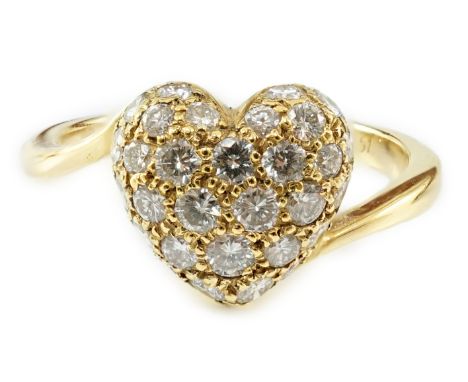 A modern Cartier 18ct gold and pave set diamond heart shaped ring, signed and numbered D58987 51, size K/L, gross weight 3.5 
