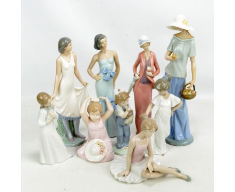 NAO; A group of figurines to include a lady with an apple basket, height 36.5cm, a sitting ballerina, a lady cradling a cat e
