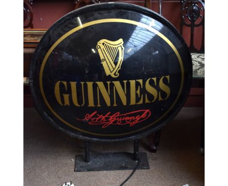 A Guinness advertising light/sign.