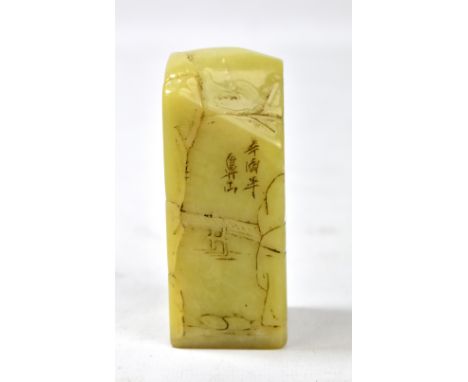 A Chinese green hardstone square section seal engraved with figural landscape with rocks and trees, height 9cm.Additional Inf