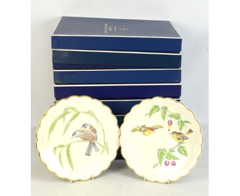 ROYAL WORCESTER; a set of ten boxed limited edition bird plates designed by Dorothy Doughty, each sold with certificate.