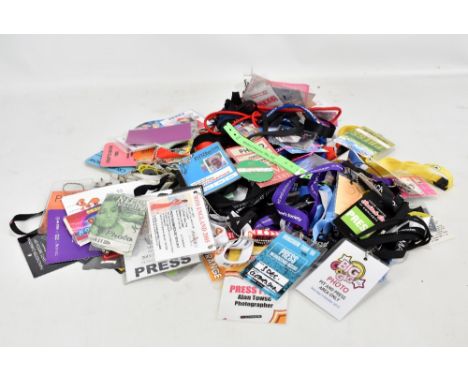A collection of press passes for music and film events including Michael Jackson Memorial, Radiohead, Kasabian, George Michae