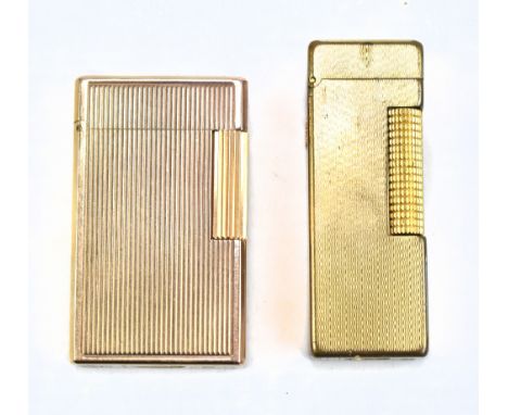 A Dunhill gold plated lighter and a Dupont example (2).