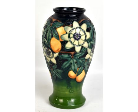 MOORCROFT; a large floral tubeline decorated vase on navy and green ground, impressed marks, WM monogram and year cipher for 