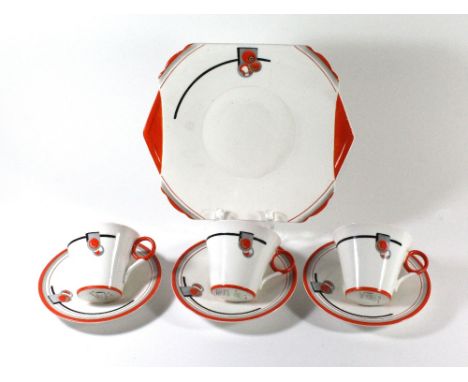 SHELLEY; three Art Deco teacups and saucers decorated with stylised circles and bands in the 'Regent' shape, together with a 
