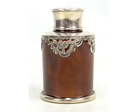 HENRY BOURNE; an Edward VII hallmarked silver tea caddy, with cylindrical stoneware body, Birmingham 1908, height 13cm.Additi