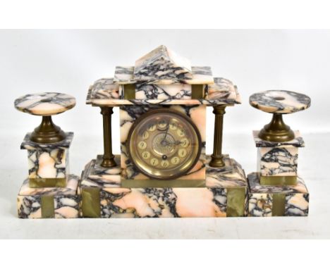 A three piece stained alabaster and onyx clock garniture, the clock of architectural form with gilt metal dial set with Arabi