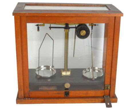 A cased set of chemist scales, marked to base, Griffin &amp; Tatlock Ltd, made in Great Britain, height 38cm.