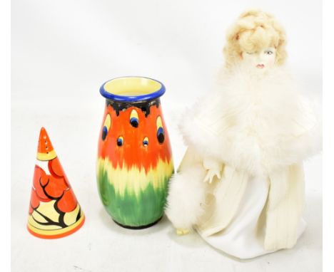 A Crown Ducal 'Firefly' vase, height 18.25cm, a Royal Doulton, a boxed Swansdown Nisbet limited edition figure, 615/5000, and