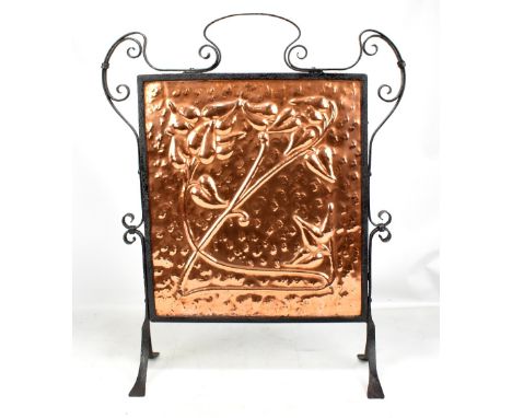 An Arts and Crafts copper and wrought iron fire screen, height 74cm.