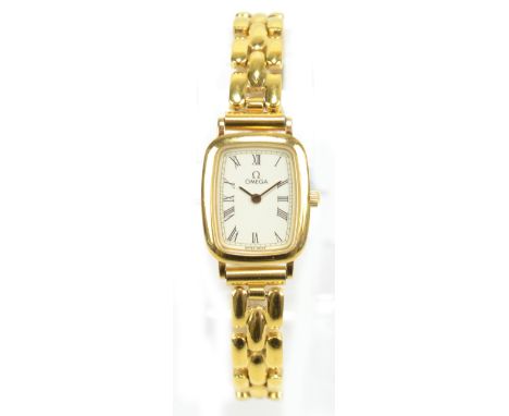 OMEGA; a lady's gilt metal 'De Ville' quartz wristwatch, the shaped rectangular dial set with Roman numerals, diameter exclud