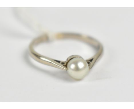A white metal ring set with single cultured freshwater pearl, stamped 18ct to band interior, size J, approx 1.9g.&nbsp;